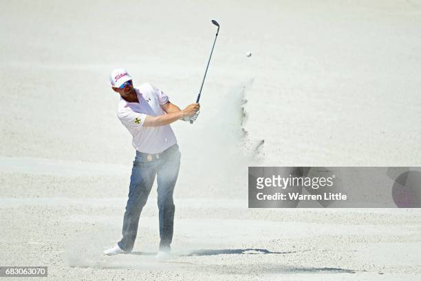 Bernd Wiesberger of Austria plays a shot from a bunker on the 11th hole during the final round of THE PLAYERS Championship at the Stadium course at...