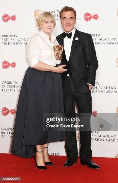 Sarah Lancashire, winner of the Leading Actress award for "Happy Valley", and James Nesbitt pose in the Winner's room at the Virgin TV BAFTA...