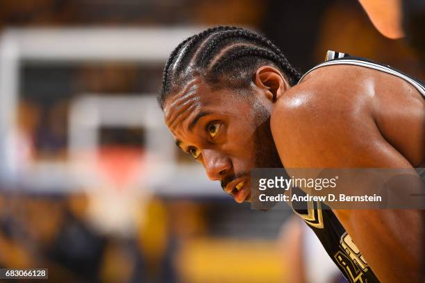 Kawhi Leonard of the San Antonio Spurs looks on during the game against the Golden State Warriors in Game One of the Western Conference Finals of the...