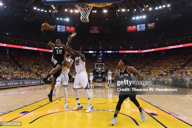 LaMarcus Aldridge of the San Antonio Spurs goes up for a dunk against the Golden State Warriors during Game One of the NBA Western Conference Finals...
