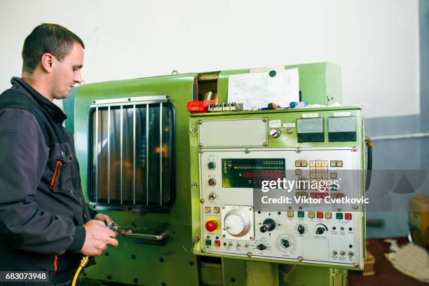 worker control cnc machine production - milling cutter stock pictures, royalty-free photos & images