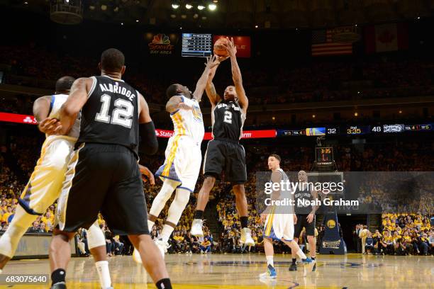 Kawhi Leonard of the San Antonio Spurs shoots the ball during the game against the Golden State Warriors during Game One of the Western Conference...