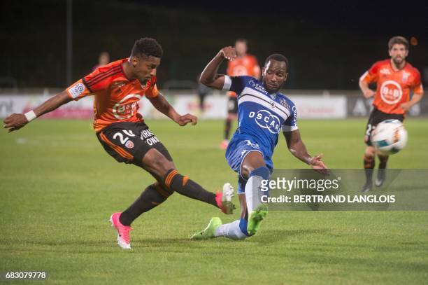 Lorient's French defender Steven Moreira vies with Bastia's French midfielder Lenny Nangis during the French L1 football match Bastia vs Lorient on...