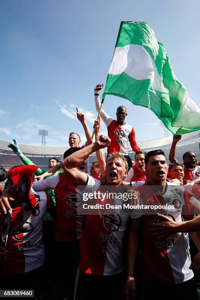 Captain, Dirk Kuyt of Feyenoord Rotterdam leads celebrations with team mates after winning the Dutch Eredivisie at De Kuip or Stadion Feijenoord on...