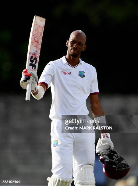 West Indies batsmen Roston Chase celebrates after scoring his 100 against Pakistan on the fifth days play of the final test match at the Windsor Park...