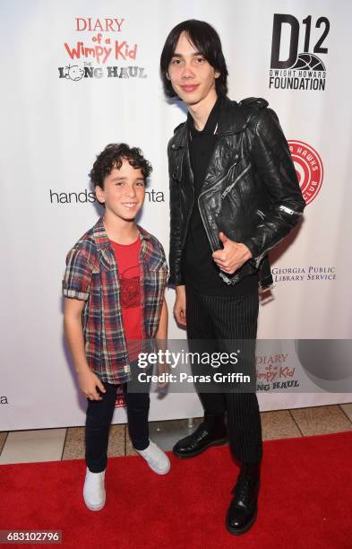 Actors Jason Drucker and Charlie Wright attend "Diary Of A Wimpy Kid: The Long Haul" Atlanta screening hosted by Dwight Howard at Regal Atlantic...