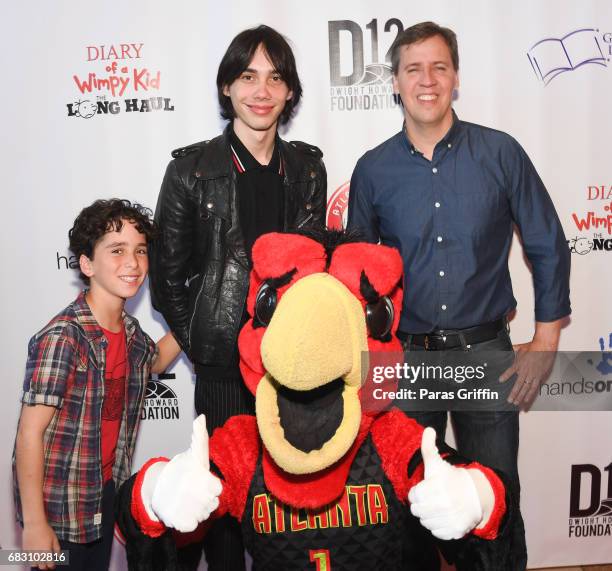 Jason Drucker, Charlie Wright, and Jeff Kinney pose with Harry The Hawk at "Diary Of A Wimpy Kid: The Long Haul" Atlanta screening hosted by Dwight...