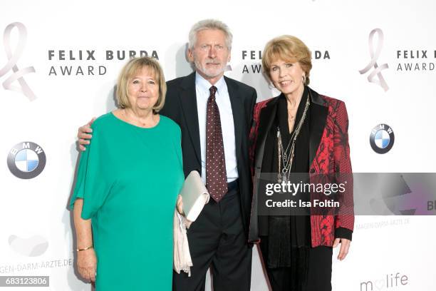 Former german soccer player Paul Breitner with his wife Hildegard Breitner and Christa Maar attend the Felix Burda Award 2017 at Hotel Adlon on May...