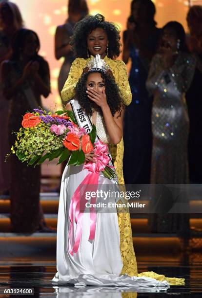 Miss District of Columbia USA 2017 Kara McCullough reacts as she is crowned Miss USA 2017 by Miss USA 2016 Deshauna Barber during the 2017 Miss USA...