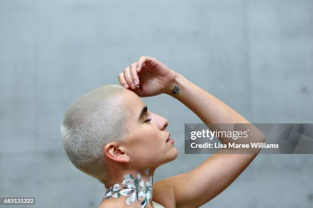 Model Sarsha Simone poses backstage ahead of the Thomas Puttick show at Mercedes-Benz Fashion Week Resort 18 Collections at Carriageworks on May 15,...