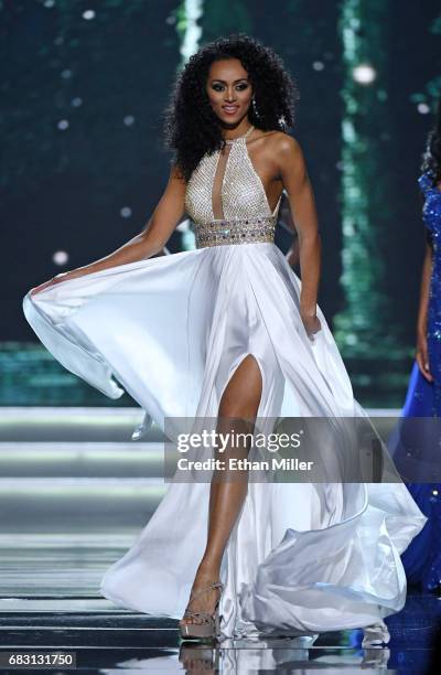 Miss District of Columbia USA 2017 Kara McCullough competes in the evening gown competition during the 2017 Miss USA pageant at the Mandalay Bay...