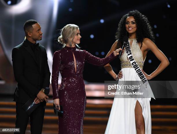 Co-hosts Terrence J and Julianne Hough look on as Miss District of Columbia USA 2017 Kara McCullough answers a question during the interview portion...