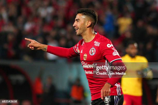 Juan Lucero of Tijuana celebrates after scoring his team's second goal during the quarter finals second leg match between Tijuana and Morelia as part...