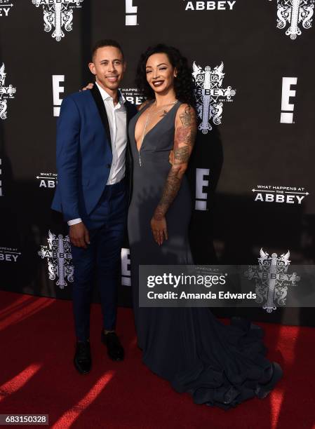 Television personalities Lawrence Carroll and Brandi J. Andrews arrive at the premiere screening for E!'s "What Happens At The Abbey" at The Abbey on...