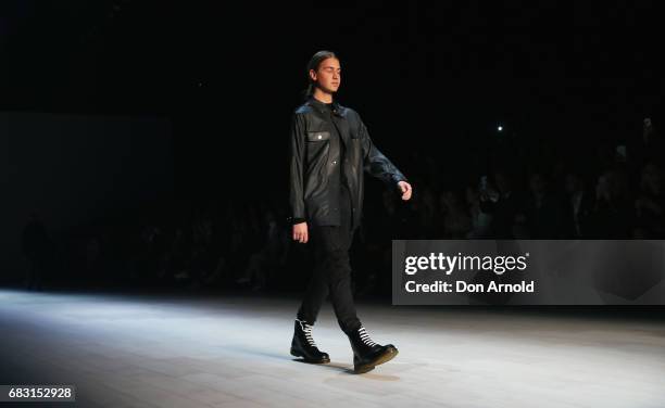 Christian Wilkins walks the runway during the Justin Cassin show at Mercedes-Benz Fashion Week Resort 18 Collections at Carriageworks on May 15, 2017...