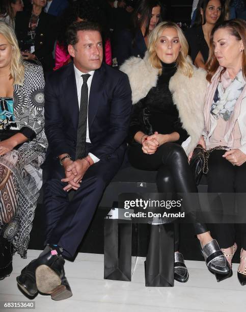 Karl Stefanovic sits front row beside his girlfriend Jasmine Yarbrough prior to the Justin Cassin show at Mercedes-Benz Fashion Week Resort 18...