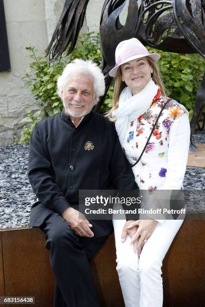 Artist and Designer Pascal Morabito and his wife attend Tribute To Jean-Claude Brialy during "Journees Nationales du Livre et du Vin"on May 14, 2017...