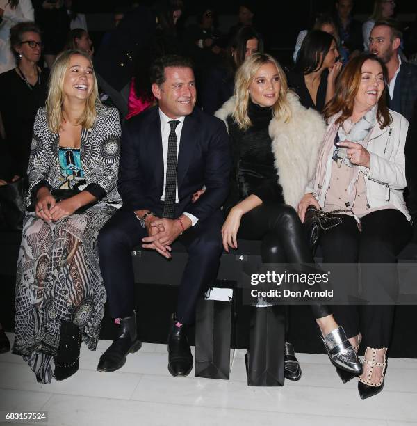 Karl Stefanovic sits front row beside his girlfriend Jasmine Yarbrough prior to the Justin Cassin show at Mercedes-Benz Fashion Week Resort 18...