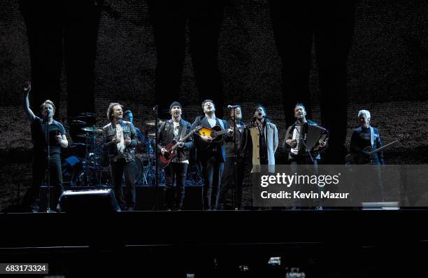 Bono, Eddie Vedder, Larry Mullen Jr., The Edge, Marcus Mumford, Ted Dwane, Winston Marshall, Ben Lovett and Adam Clayton perform onstage during U2...