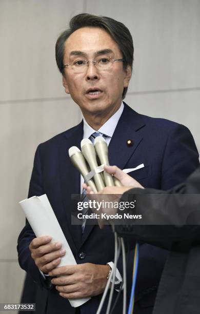 Japanese Economic and Fiscal Policy Minister Nobuteru Ishihara speaks to reporters after holding talks with New Zealand Trade Minister Todd McClay in...