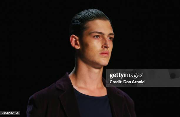 Model walks the runway during the Justin Cassin show at Mercedes-Benz Fashion Week Resort 18 Collections at Carriageworks on May 15, 2017 in Sydney,...