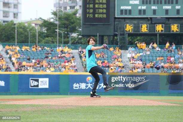Actor Jerry Yan throws the first pitch for a professional baseball game on May 14, 2017 in Taipei, Taiwan.