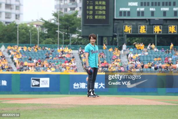 Actor Jerry Yan throws the first pitch for a professional baseball game on May 14, 2017 in Taipei, Taiwan.
