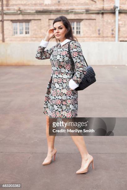 Personality and Former Miss Australia Nicole OÕNeill wearing a Jill Sander dress, Christina Louboutin shoes and Chanel bag during Mercedes-Benz...