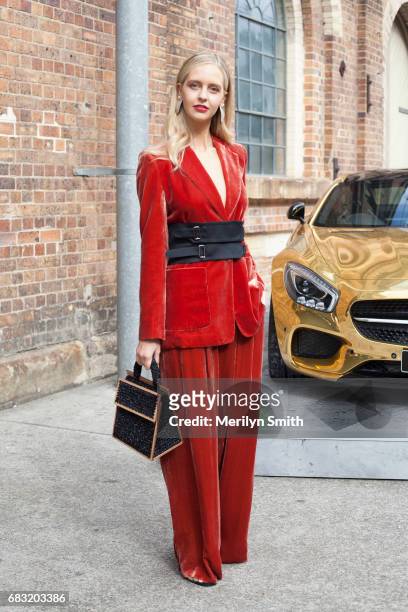 Creative Director of Bear Journal Saasha Burns is wearing a Bianca Spender suit, Jaager shoes and Seven Eleven shoes during Mercedes-Benz Fashion...