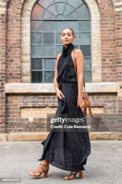 Sammy Robinson wearing a Shona Joy dress, Bellini shoes and Chloe bag during Mercedes-Benz Fashion Week Resort 18 Collections at Carriageworks on May...