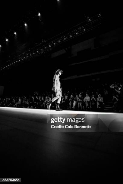 Model walks the runway during the Justin Cassin show at Mercedes-Benz Fashion Week Resort 18 Collections at Carriageworks on May 15, 2017 in Sydney,...