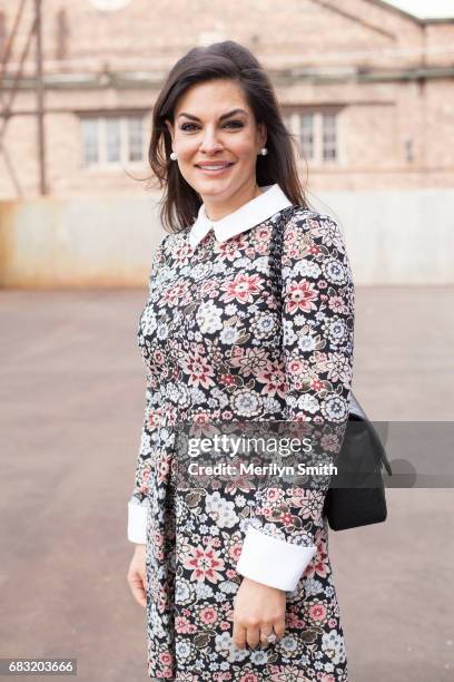 Personality and Former Miss Australia Nicole OÕNeill is wearing a Jill Sander dress and Chanel bag during Mercedes-Benz Fashion Week Resort 18...