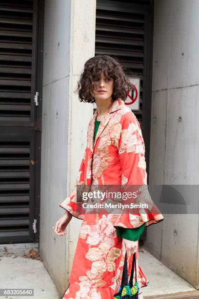 Fashion Stylist Chloe Hill is wearing a Tome coat and a vintage bag during Mercedes-Benz Fashion Week Resort 18 Collections at Carriageworks on May...