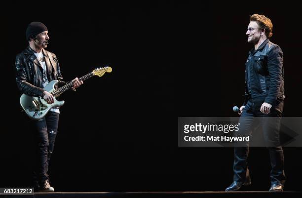 The Edge and Bono of U2 perform on stage during the 'Joshua Tree Tour 2017' at CenturyLink Field on May 14, 2017 in Seattle, Washington.