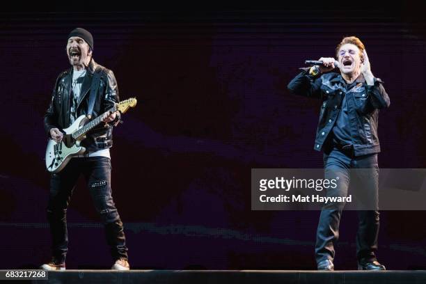 The Edge and Bono of U2 perform on stage during the 'Joshua Tree Tour 2017' at CenturyLink Field on May 14, 2017 in Seattle, Washington.