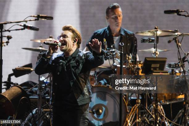 Drummer Larry Mullen Jr. And singer Bono of U2 perform on stage during the 'Joshua Tree 2017' Tour at CenturyLink Field on May 14, 2017 in Seattle,...