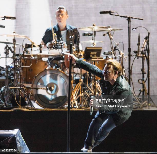 Drummer Larry Mullen Jr. And singer Bono of U2 perform on stage during the 'Joshua Tree 2017' Tour at CenturyLink Field on May 14, 2017 in Seattle,...