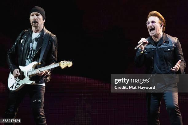 The Edge and Bono of U2 perform on stage during the 'Joshua Tree Tour 2017' at CenturyLink Field on May 14, 2017 in Seattle, Washington.