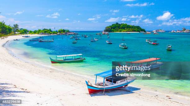 sailboats by the belitung beach, indonesia - bali beach ストックフォトと画像