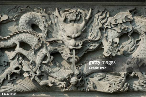 detail of chinese dragon statue with sunlight - chinese dragon stock pictures, royalty-free photos & images