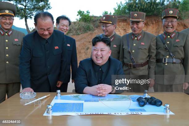 This picture taken on May 14, 2017 and released from North Korea's official Korean Central News Agency on May 15 shows North Korean leader Kim...