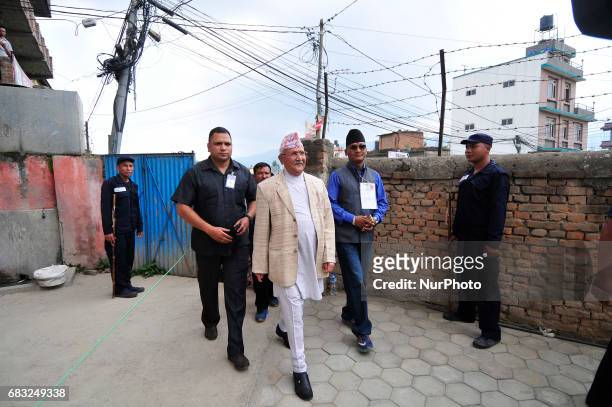 Khadga Prasad Sharma Oli, Chairman of Communist Party of Nepal arrives to casts his vote in the local level election of municipalities and villages...