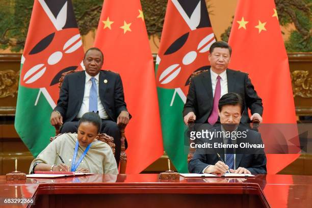 Chinese President Xi Jinping and Kenyan President Uhuru Kenyatta attend a signing ceremony after their bilateral meeting during the Belt and Road...