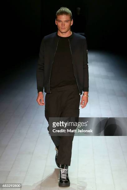 Jordan Barrett walks the runway during the Justin Cassin show at Mercedes-Benz Fashion Week Resort 18 Collections at Carriageworks on May 15, 2017 in...