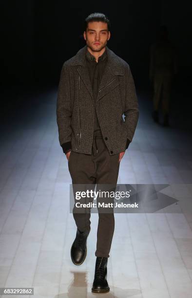 Model walks the runway during the Justin Cassin show at Mercedes-Benz Fashion Week Resort 18 Collections at Carriageworks on May 15, 2017 in Sydney,...