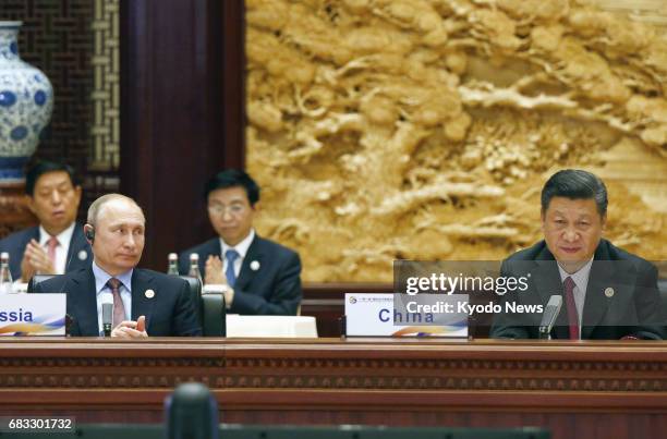 Chinese President Xi Jinping and Russian President Vladimir Putin attend a summit at the Belt and Road Forum for International Cooperation in Beijing...