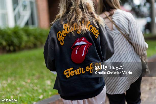 Guest wearing a Rolling Stones jacket at day 2 during Mercedes-Benz Fashion Week Resort 18 Collections at Carriageworks on May 15, 2017 in Sydney,...