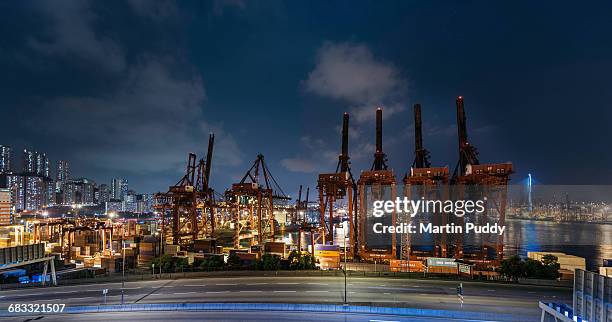 cranes at hong kong's container port - hong kong harbour stockfoto's en -beelden