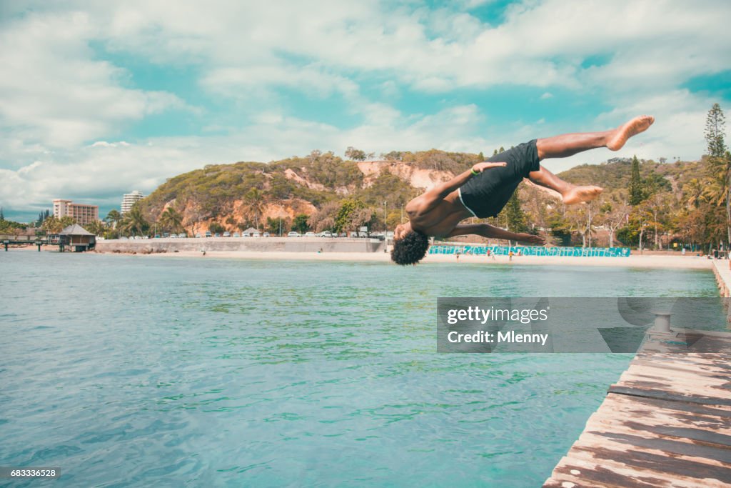 Pacific Islander Backflip into the Water Noumea Beach New Caledonia