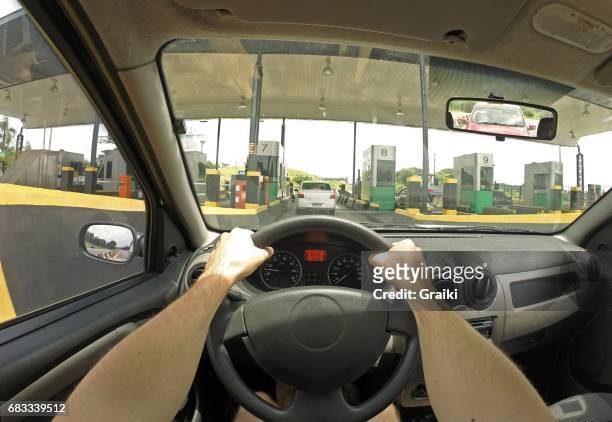 pov of driver on the toll - tolls stock pictures, royalty-free photos & images